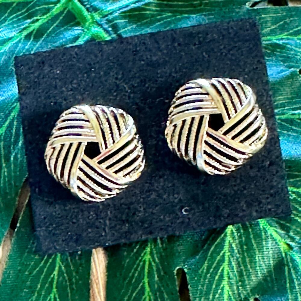 Statement stud golden earrings